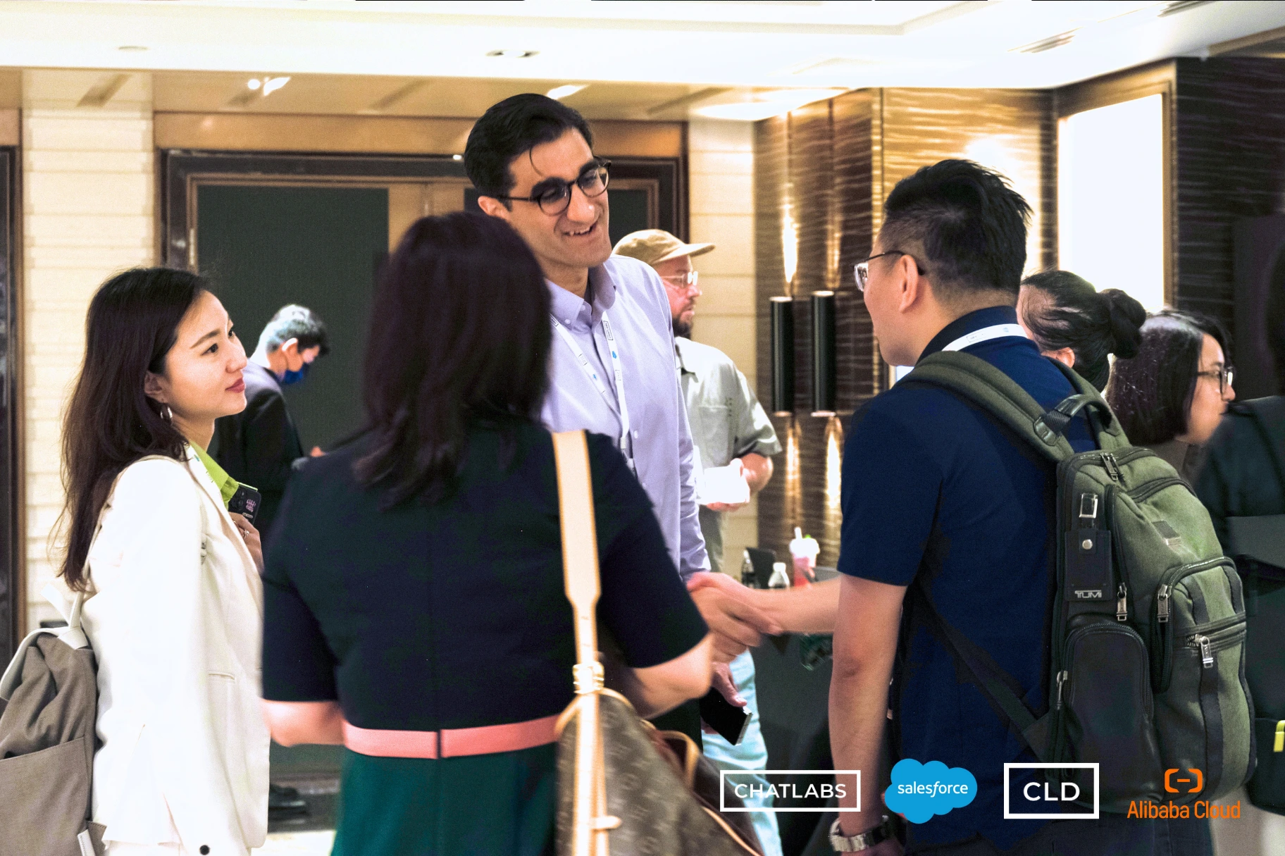 Guests conversing in at CLD x Salesforce x Alibaba Cloud Event